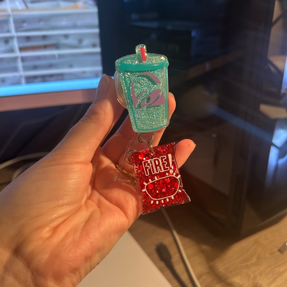 Taco Bell Drink and Fire Sauce Badge Reel